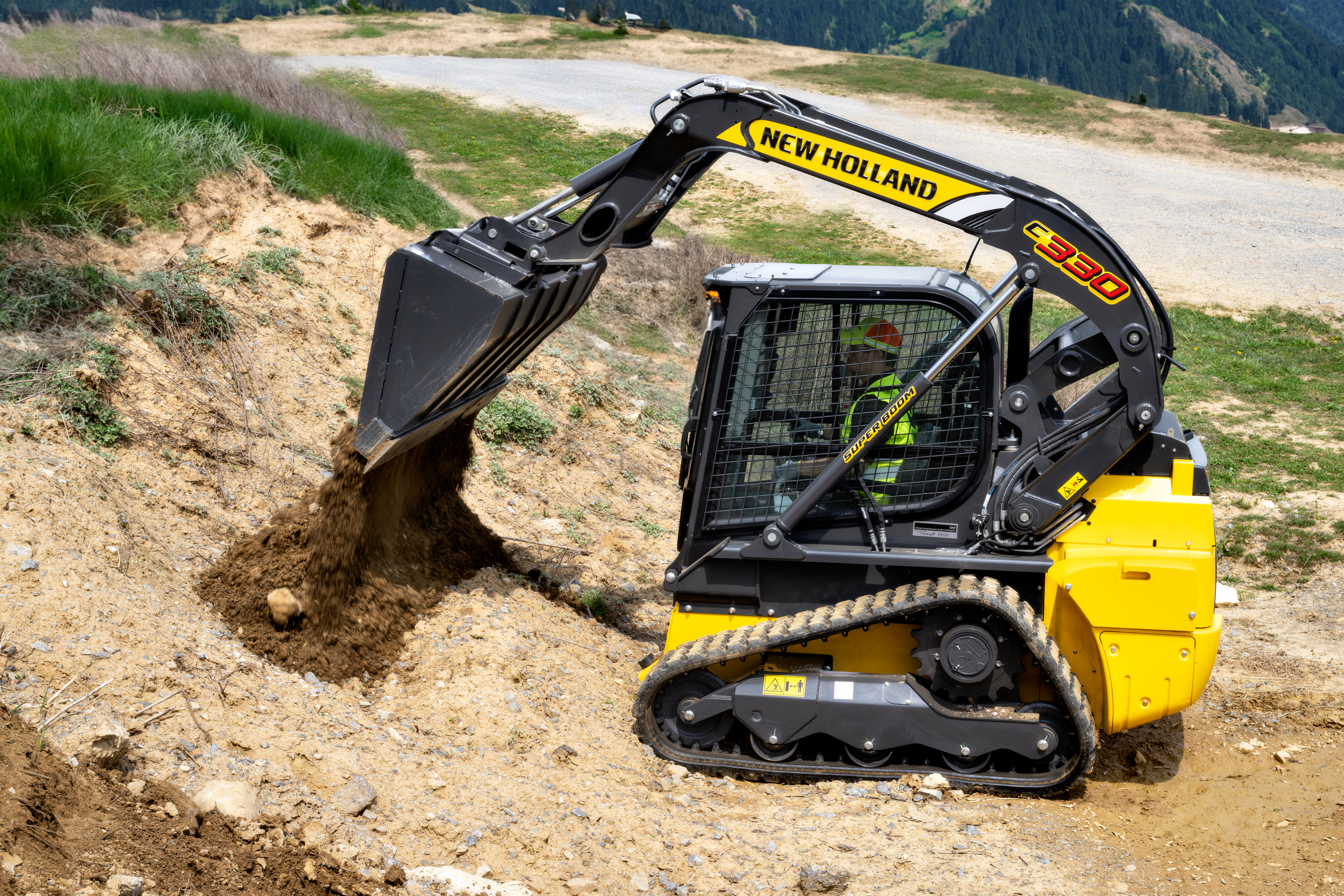 Equipped with a 66-in. working width and a 67-hp engine, the C330 vertical lift compact track loader features heavy load-carrying capacity to handle the transportation of substantial materials such as rocks, stone and timber.