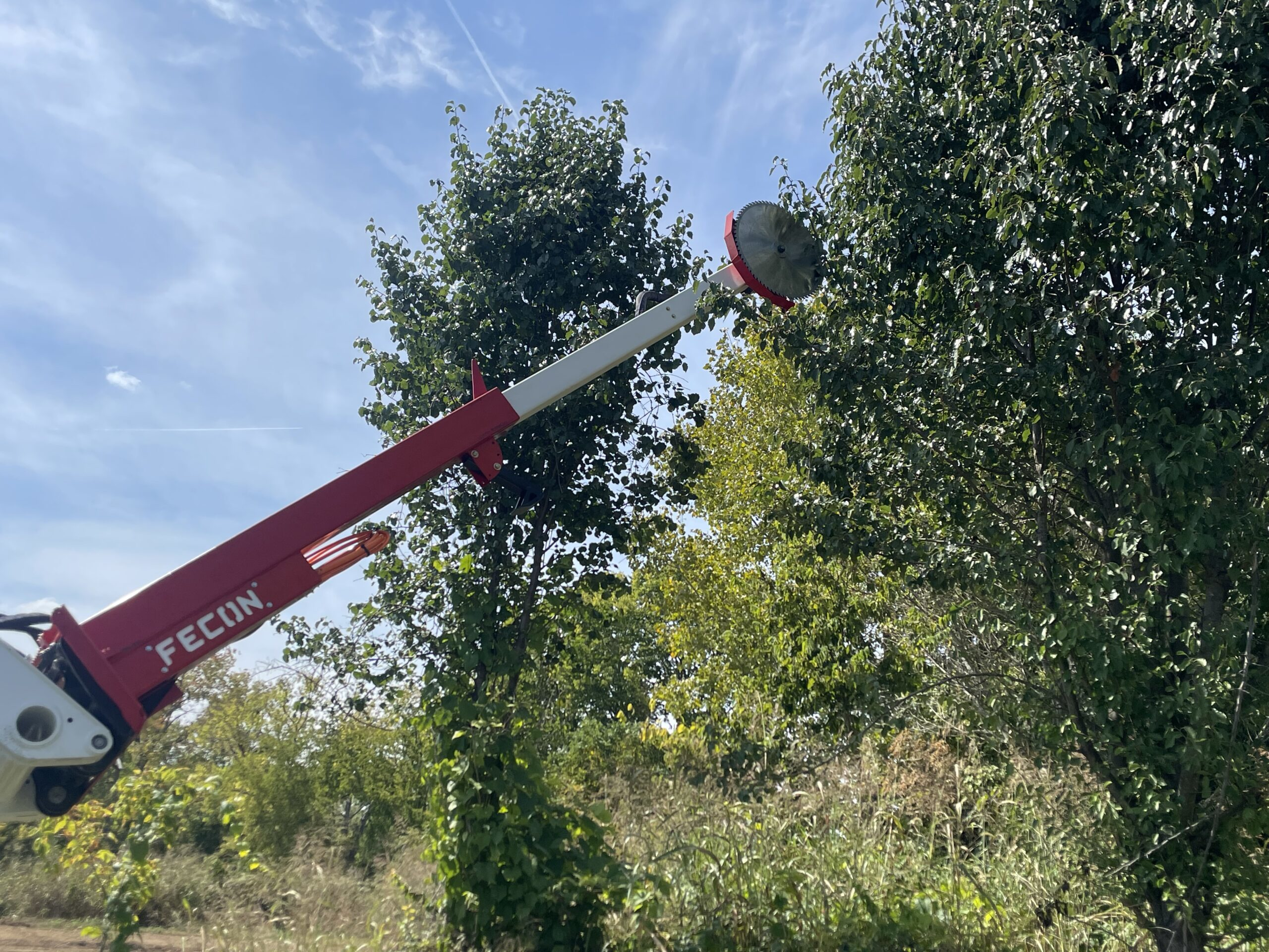 The company's Trim Ex saw attachments are low-maintenance solutions (no loose chains or require any bar oil for lubrication) for site preparation, land clearing, landscaping and trimming with machines.