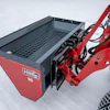 The drop spreader is capable of spreading salt, sand and fine gravel for use on a variety of applications, including parking lots, courtyards, walkways and pedestrian paths.