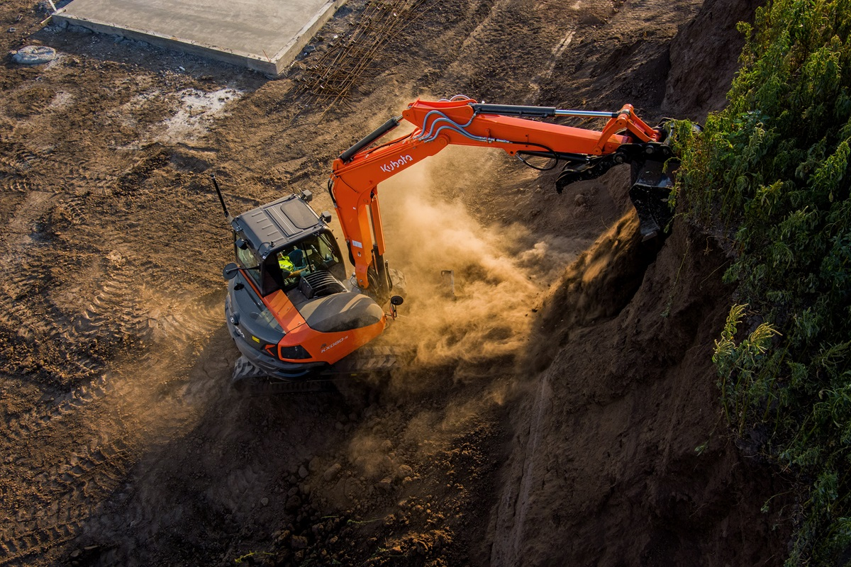 Equipped with a 66.6-hp (SAE J1995 gross) Kubota engine, the KX080-5 features a digging depth of 15 ft., 1.1 in. and a maximum dumping height of 17 ft., 2.7 in.