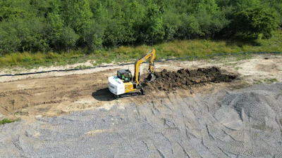 Z Quip Excavator Digging At Moog Construction Test Site In West Seneca, New York, Usa