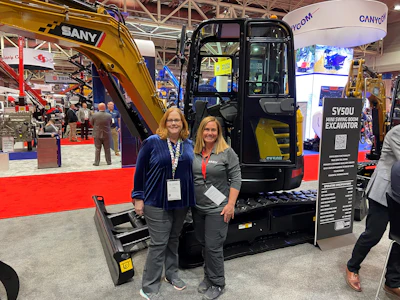 The SANY team had dealers at their booth to help customers with purchases.