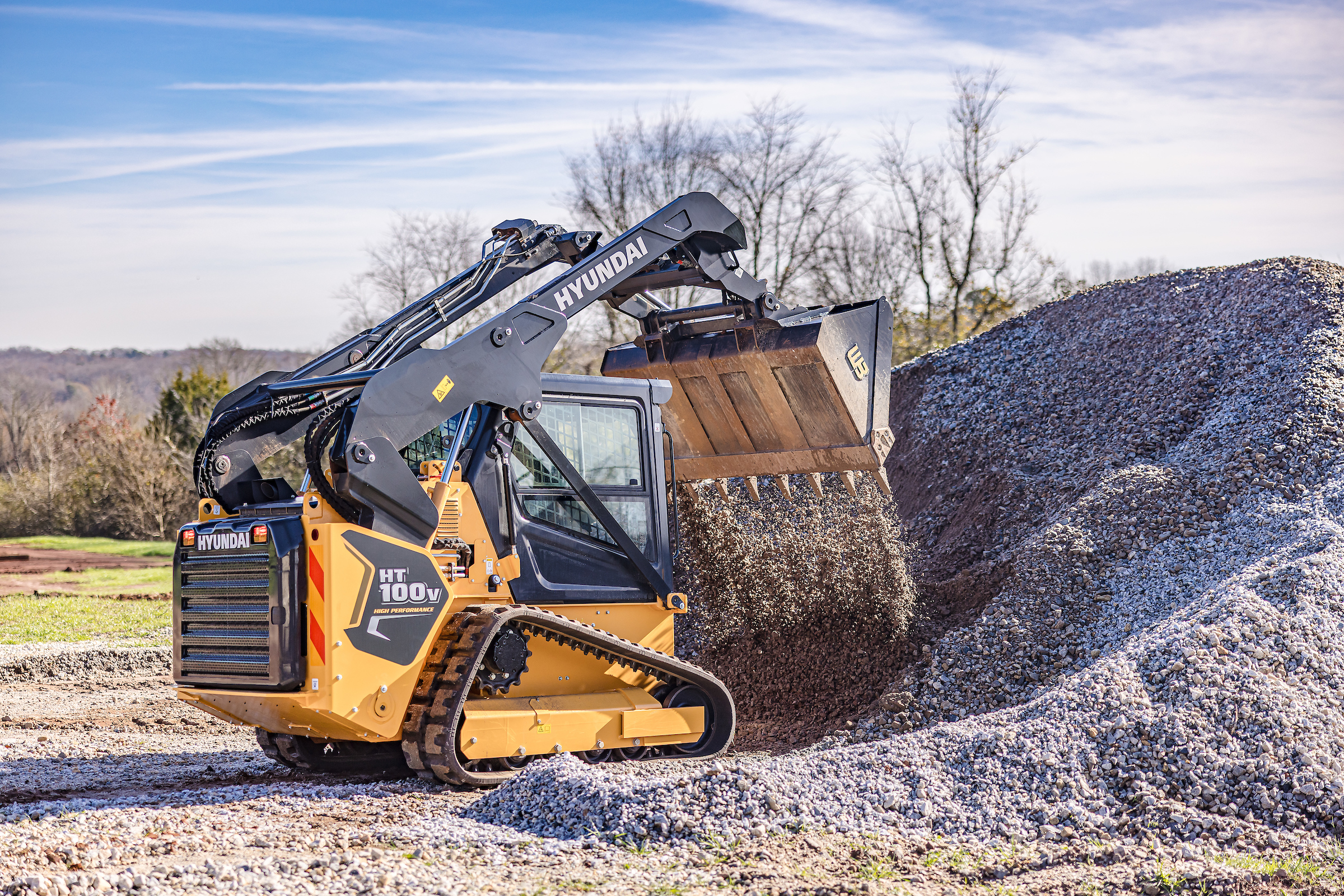 The Hyundai HT100V CTL working in a gravel-hauling application.