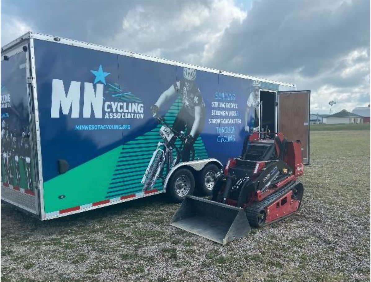 A compact utility loader and power buggy were donated to help make the project easier.