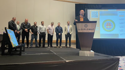 A photo from the SWIFTT event. The FDOT secretary is at the podium with the participants in the past (except Dan Hurtado, FDOT, second from left).