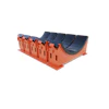 The new arrangement includes larger pad cartridges for durability and a reinforced point of connection between the pads and cradle frame.