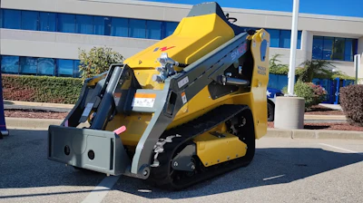 The Wacker Neuson SM100 is rated at 1,000 pounds of operating capacity at 35 percent of tipping. In terms of size, the SM100 is 35.5 inches wide, compact enough to fit through a 36-inch wide gate.