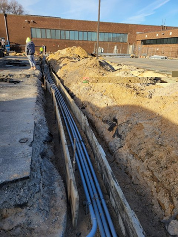 The project required extensive trenching to install EV charging stations.