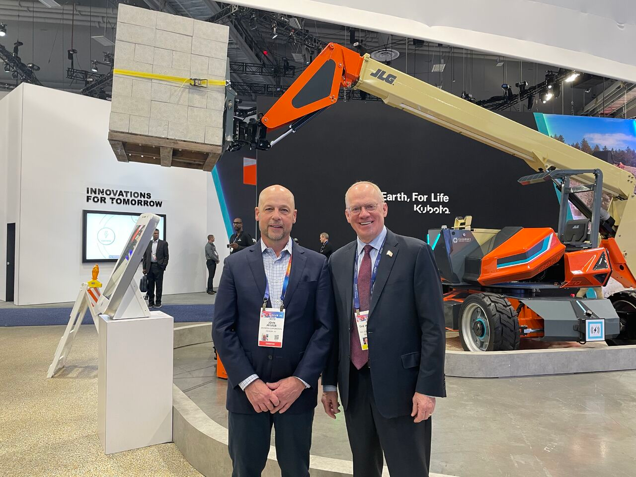 At CES 2025, Oshkosh CEO John Pfeifer (at left) and Rep. John Rose (Tenn. 6th Congressional District, at right). Tennessee is home of key growth manufacturing facilities for Oshkosh.