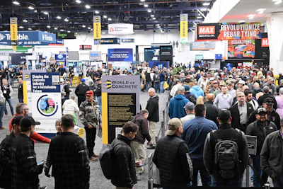 Attendees patiently waited at registration at the North Hall.