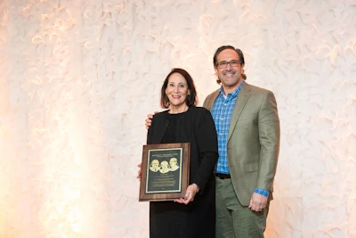 Sandy And Jeff Eder Accepting On Behalf Of Glenn Eder