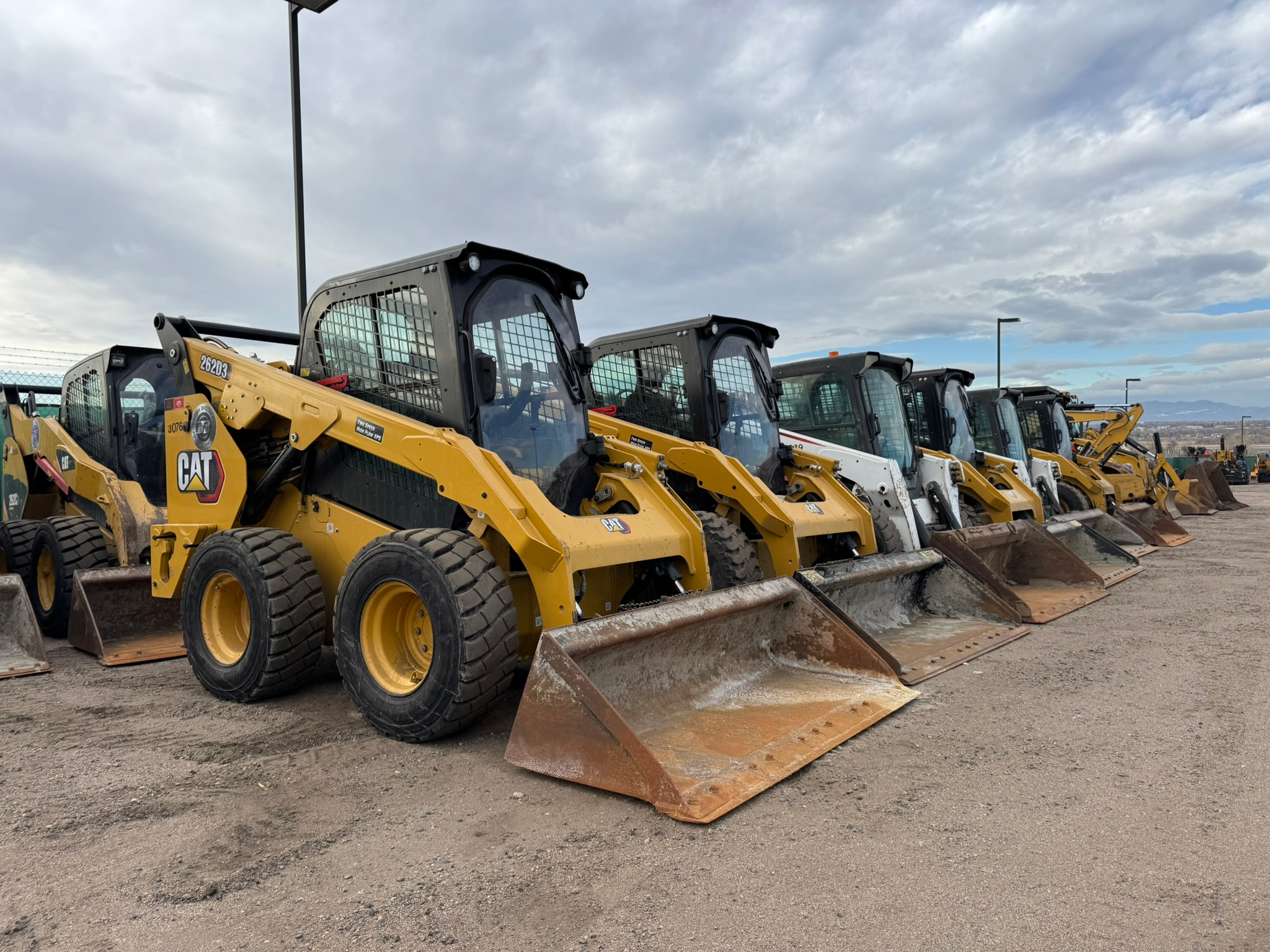 (top Left) Cat & Bobcat Skid Steer Loaders