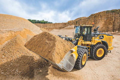 John Deere's new 824 X-Tier loader features the John Deere Electric Variable Transmission (EVT) E-Drive system. It is equipped with a JD9 diesel engine as the primary power source, however, the torque converter and traditional transmission have been replaced by the EVT system. In addition, the E-Drive component provides instant power, while simplifying operation and reducing complexity.