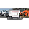 Diagnostic software laptop with commercial truck and Kubota machinery