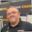 Professional at Pavement trade show booth with digital display Headshot