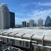 Louisville downtown skyline with modern skyscrapers and white convention center