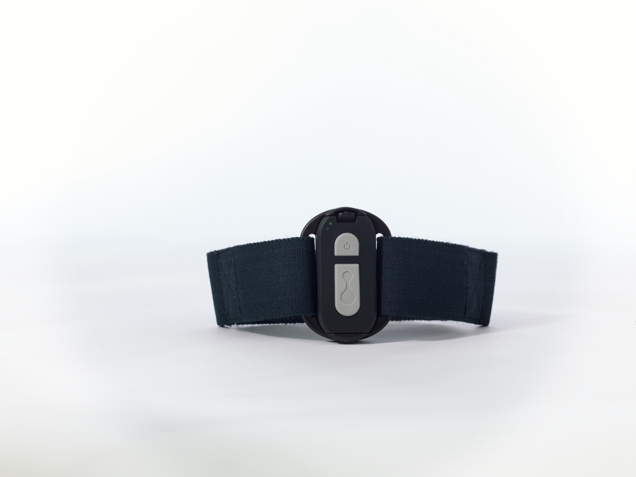 Black fitness tracker or wearable device with elastic band