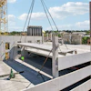 Prefabricated building components accelerate construction timelines and increase safety on the jobsite.