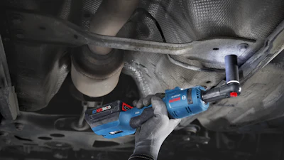Blue Bosch cordless ratchet being used under vehicle chassis during automotive repair
