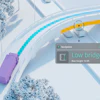 Aerial navigation view of purple truck approaching low bridge on snowy road
