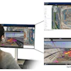 Construction site aerial mapping with drone monitoring screens showing site progress