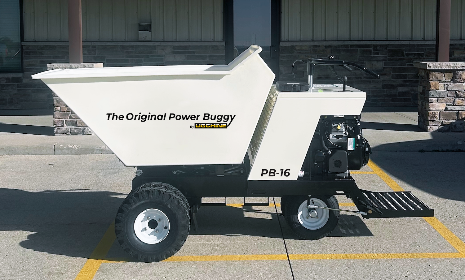 White Power Buggy PB-16 construction vehicle parked on concrete with yellow lines