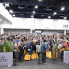 Crowded convention lobby at World of Concrete trade show with attendees