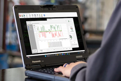 Panasonic laptop displaying data analysis graph in technical workspace