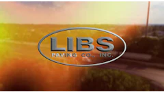 Libs Paving Company metallic blue logo on sunset-colored background