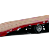 Red and silver tilt-bed trailer with extended loading ramp