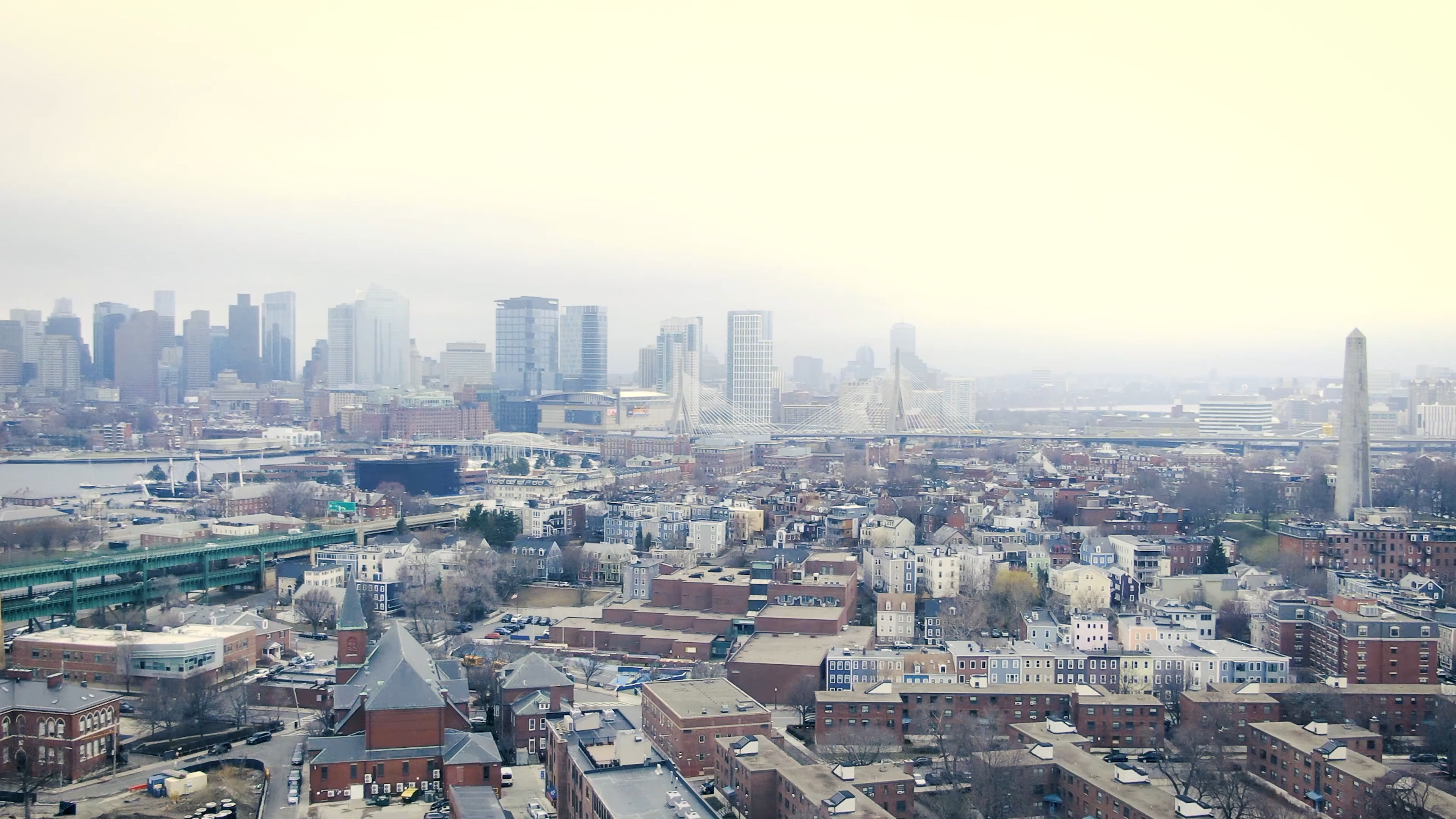 Misty urban cityscape with high-rise buildings and dense metropolitan architecture