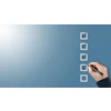 Hand checking off completed tasks on a blue checklist with pen