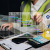 Construction worker in safety gear interacting with holographic project management dashboard and Gantt charts