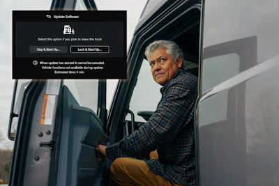 Truck driver in cab with software update dialog displaying stay and start up or lock and start up options
