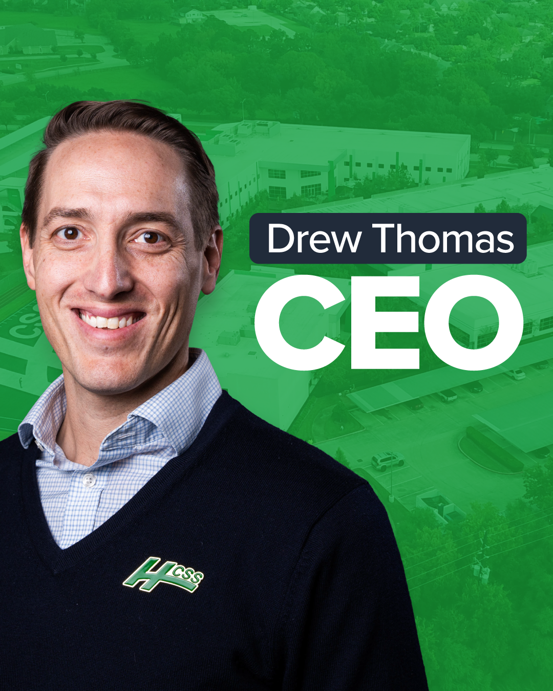 Drew Thomas, CEO, professional headshot with green background and industrial facility