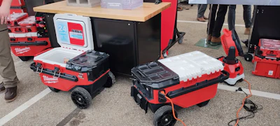 Milwaukee tool storage solutions and portable toolboxes displayed at an outdoor event or trade show
