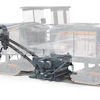 Wirtgen asphalt paver with tracked undercarriage and hopper system for road construction