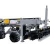 Landini agricultural manure spreader with gray tank, black chassis, and large tires on white background