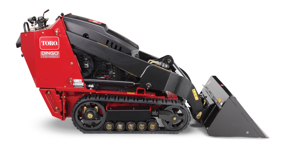 Red and black TORO DINGO tracked debris loader with front bucket attachment and engine compartment visible