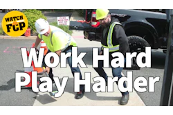 Construction workers in safety gear working on pavement with FCP watch logo overlay